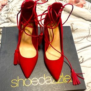 Red suede heels 2 to 3 inches lace up They were never worn